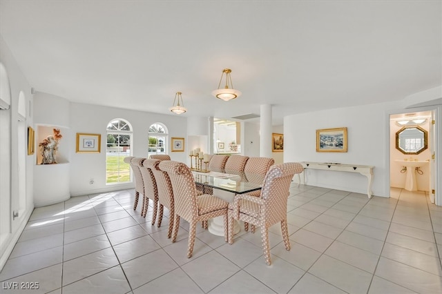 dining room featuring light tile patterned floors