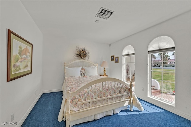 bedroom featuring access to exterior, carpet, visible vents, and baseboards