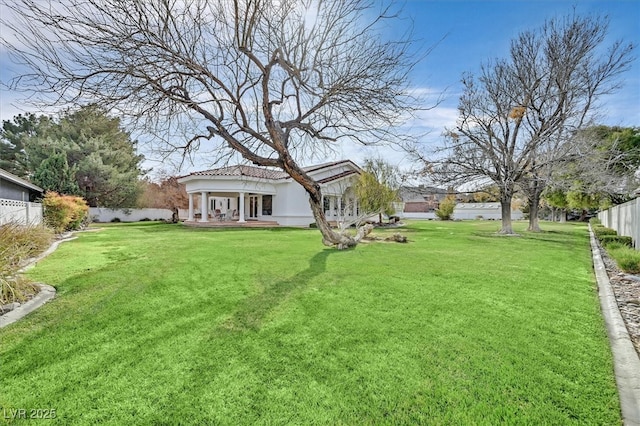 view of yard featuring a fenced backyard