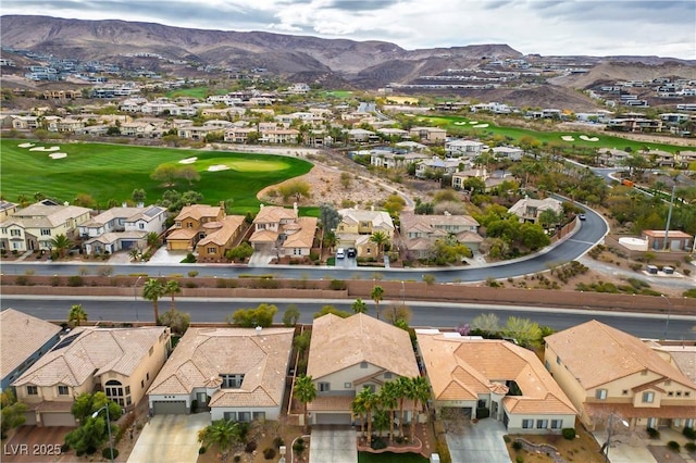 bird's eye view featuring view of golf course, a residential view, and a mountain view