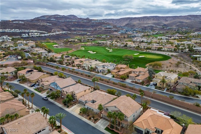 bird's eye view with a residential view, a mountain view, and golf course view