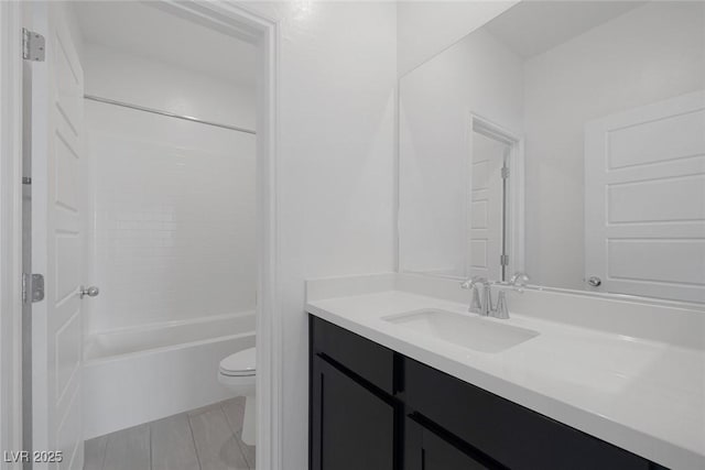 full bathroom with bathtub / shower combination, vanity, toilet, and tile patterned floors