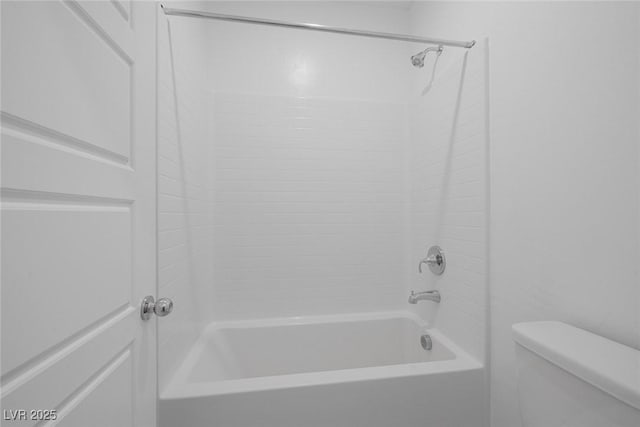 full bath featuring shower / bathing tub combination and toilet