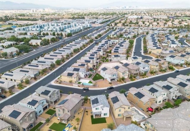 birds eye view of property with a residential view