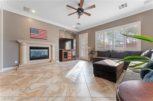 tiled living area featuring visible vents and crown molding