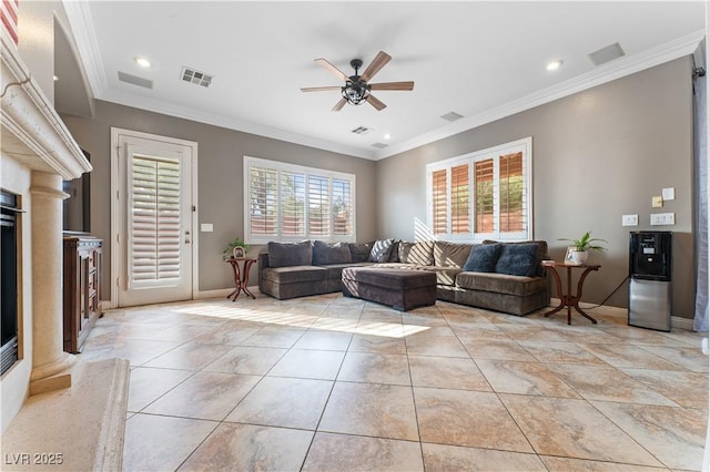 living room with light tile patterned floors, visible vents, and crown molding