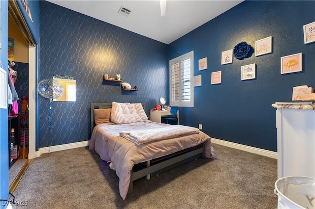 bedroom with carpet flooring, visible vents, baseboards, and multiple windows