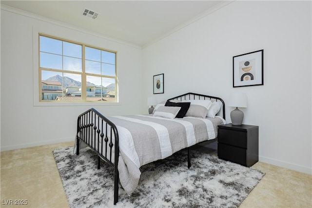 carpeted bedroom with ornamental molding, visible vents, and baseboards