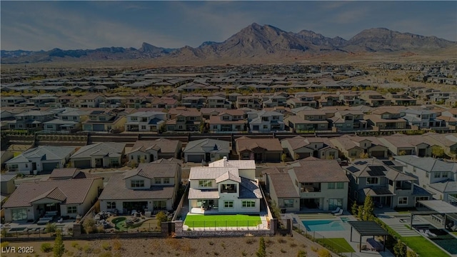 bird's eye view with a residential view and a mountain view