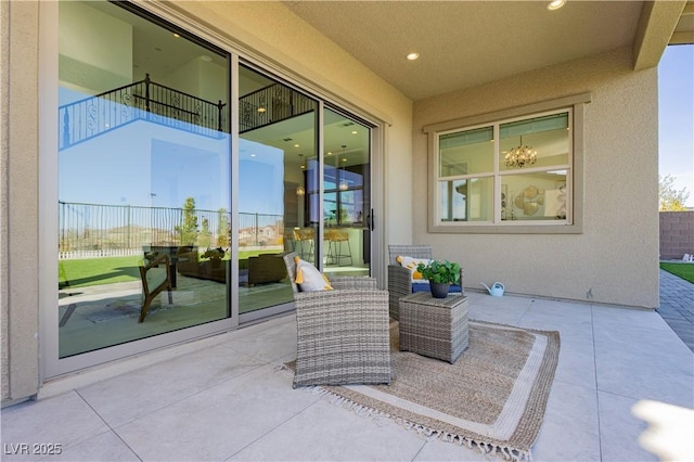 view of patio with a balcony