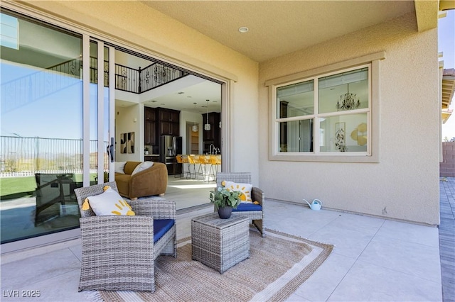 view of patio with a balcony