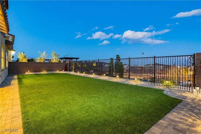 view of yard featuring a fenced backyard