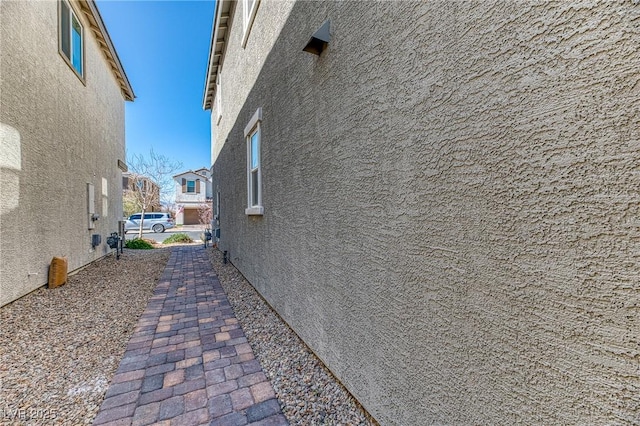 view of home's exterior with stucco siding