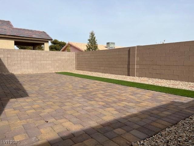 view of patio featuring a fenced backyard