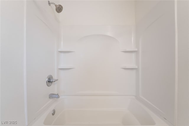 bathroom featuring washtub / shower combination