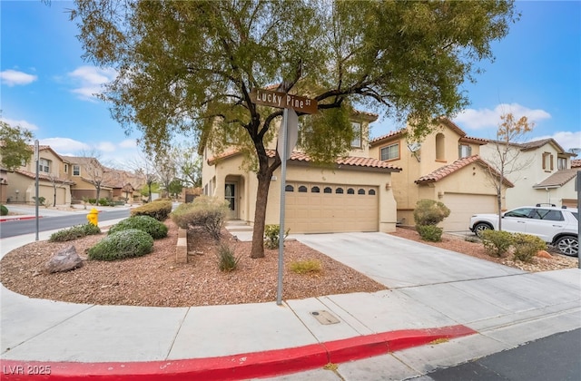 mediterranean / spanish-style home with stucco siding, a garage, a residential view, driveway, and a tiled roof