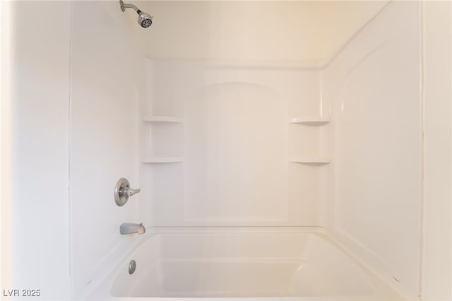 bathroom with shower / tub combination