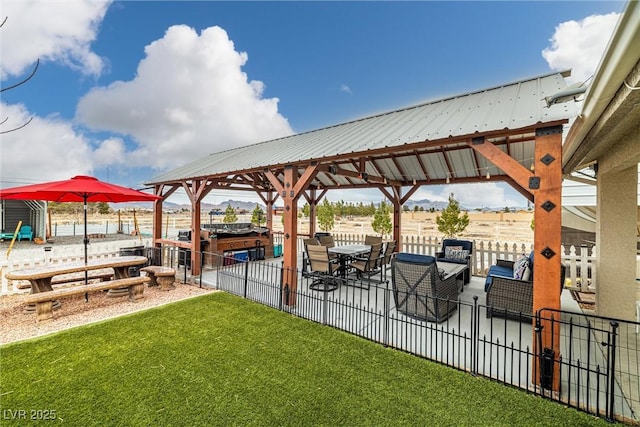 exterior space with a gazebo and fence