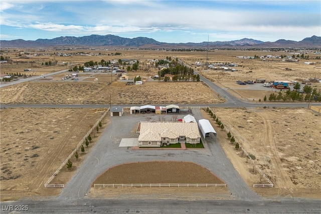 drone / aerial view with a mountain view and a rural view