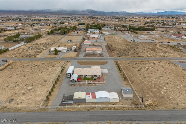 bird's eye view with a mountain view