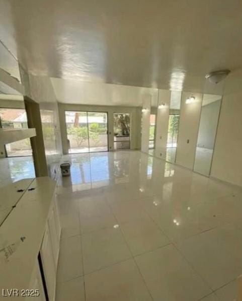 empty room featuring tile patterned flooring