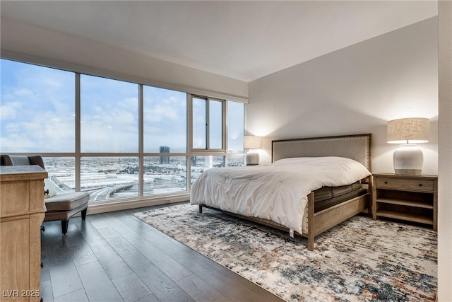 bedroom with wood-type flooring