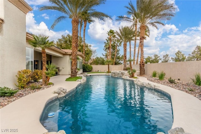 view of pool featuring a fenced in pool and a fenced backyard