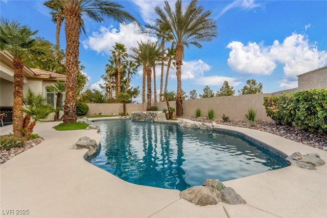 view of swimming pool with a fenced in pool, a patio area, and a fenced backyard