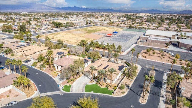 bird's eye view featuring a residential view and a mountain view