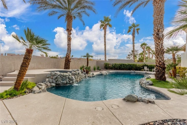 view of swimming pool featuring a fenced in pool, a patio area, and a fenced backyard