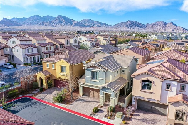 birds eye view of property featuring a residential view and a mountain view