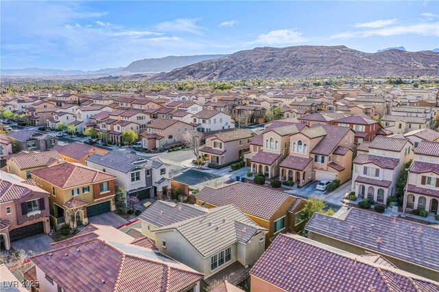 drone / aerial view with a mountain view and a residential view