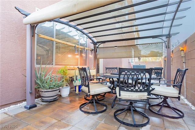 view of patio with outdoor dining area