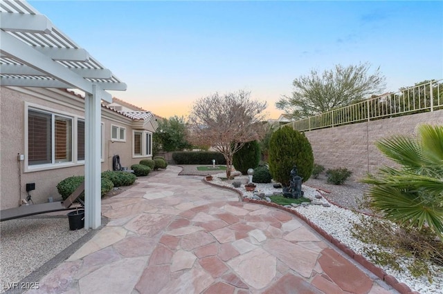 view of patio / terrace with a pergola and a fenced backyard