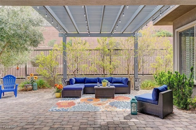 view of patio featuring a pergola, a fenced backyard, and an outdoor hangout area