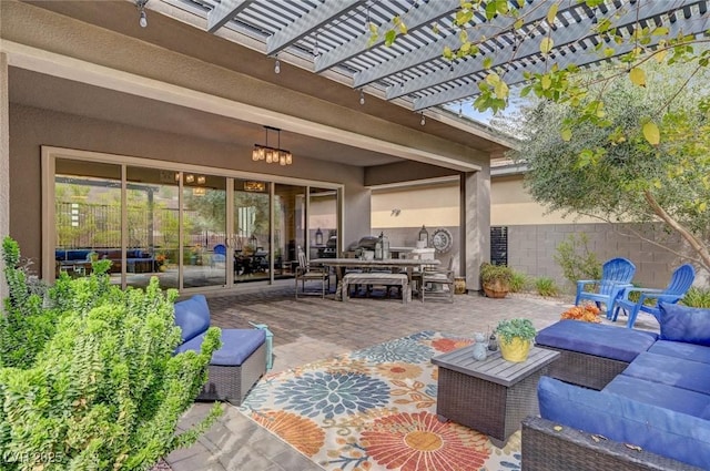 view of patio featuring outdoor dining area, fence, an outdoor living space, and a pergola