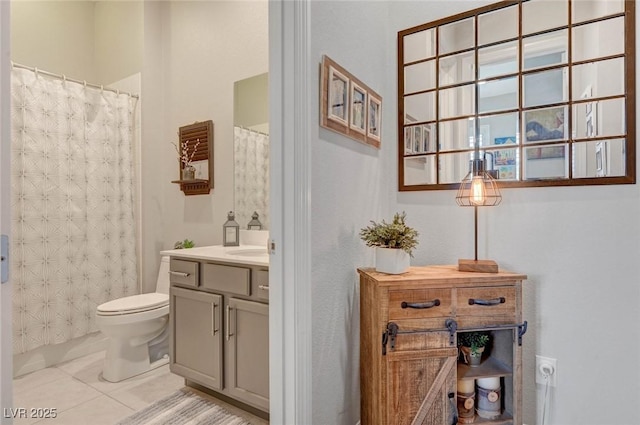 bathroom featuring vanity, tile patterned flooring, toilet, and a shower with curtain