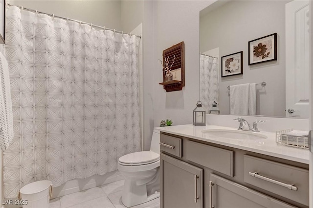 full bath featuring toilet, curtained shower, vanity, and tile patterned floors