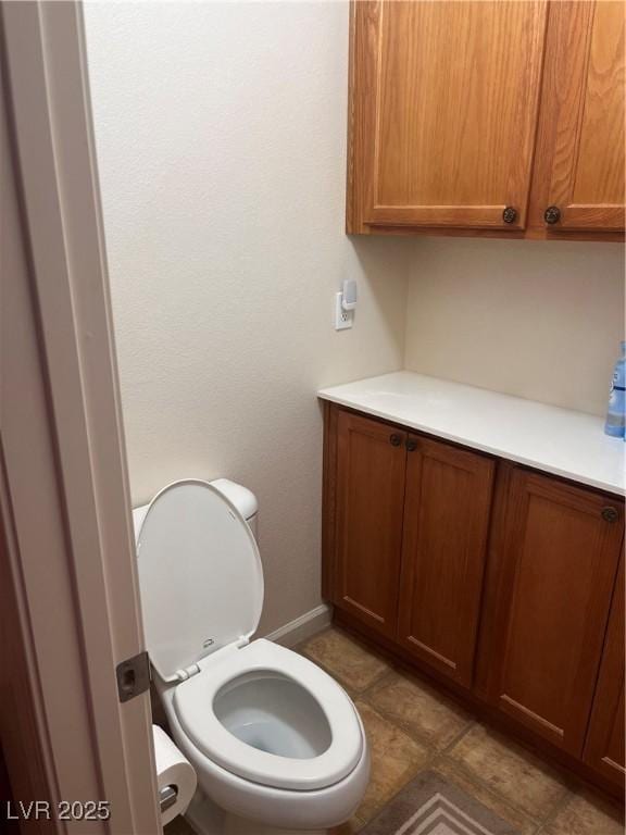 bathroom featuring toilet