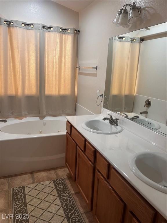 full bath with double vanity, a combined bath / shower with jetted tub, and a sink