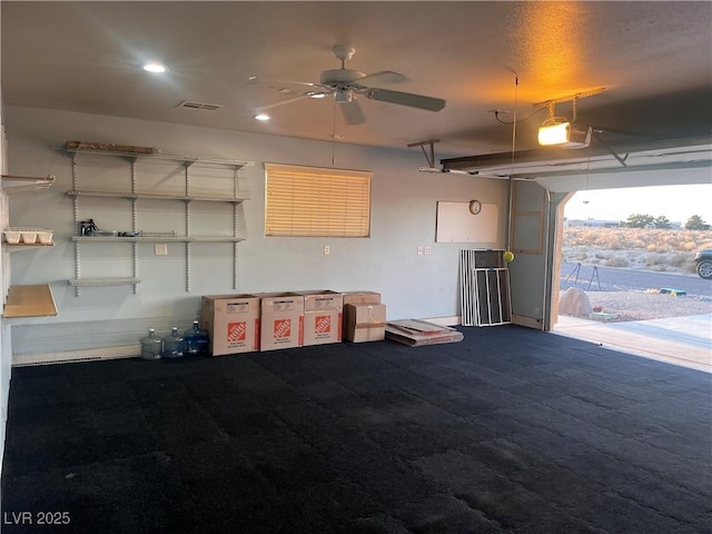 garage with recessed lighting, ceiling fan, visible vents, and a garage door opener