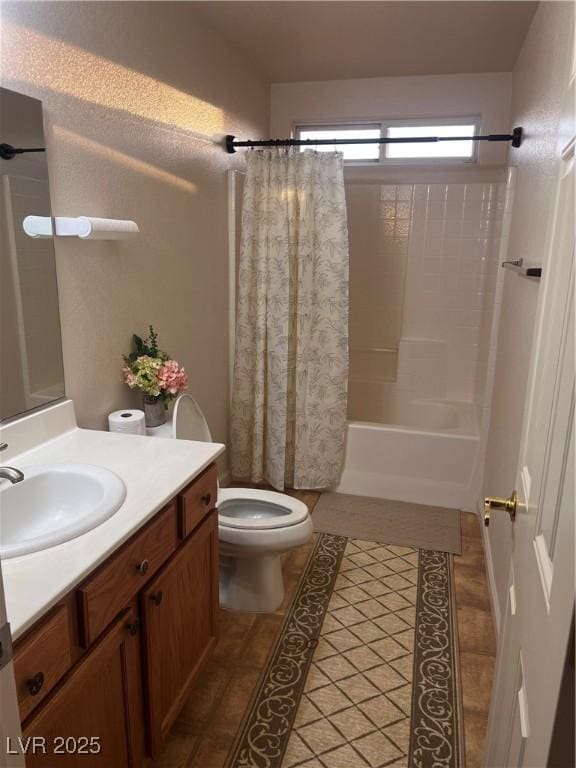 bathroom with shower / tub combo, tile patterned flooring, vanity, and toilet