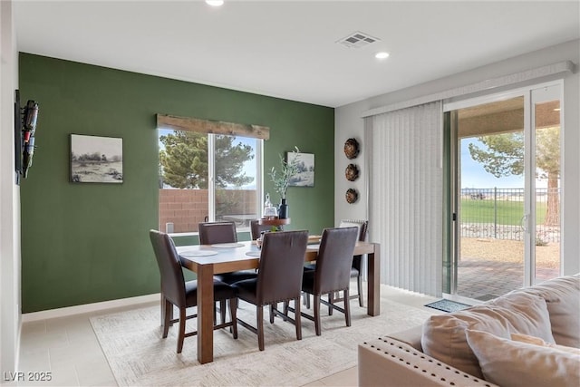 dining space featuring light tile patterned flooring, baseboards, visible vents, and recessed lighting