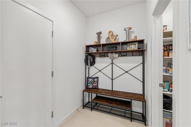 mudroom featuring light tile patterned flooring