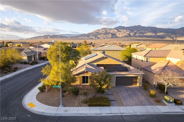 exterior space featuring a residential view and a mountain view