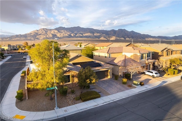 exterior space featuring a mountain view and a residential view