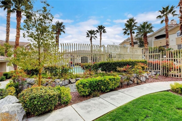 surrounding community featuring fence and a pergola