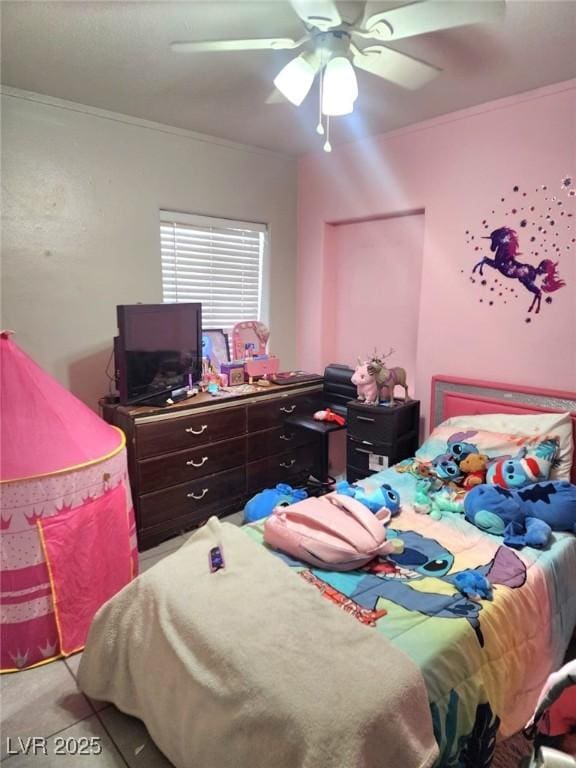 bedroom featuring ornamental molding and a ceiling fan