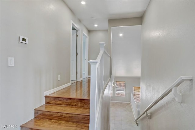 staircase with recessed lighting, visible vents, and baseboards