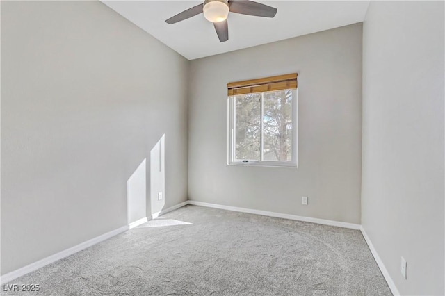 unfurnished room with carpet floors, ceiling fan, and baseboards